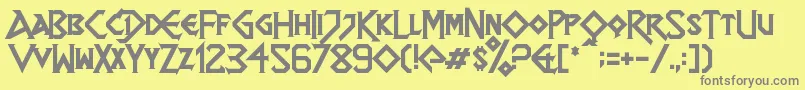 Dragonslapper-Schriftart – Graue Schriften auf gelbem Hintergrund