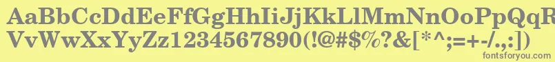 NewCenturySchoolbookРџРѕР»СѓР¶РёСЂРЅС‹Р№-Schriftart – Graue Schriften auf gelbem Hintergrund