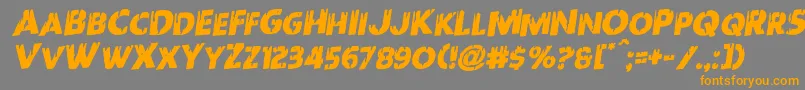 フォントRedundeadrotal – オレンジの文字は灰色の背景にあります。