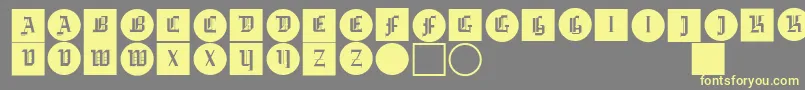 Gotikabuttonsone Font – Yellow Fonts on Gray Background