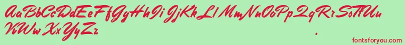 フォントStephensHeavyWriting – 赤い文字の緑の背景