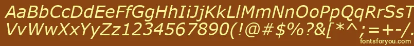 VerdanaРљСѓСЂСЃРёРІ-fontti – keltaiset fontit ruskealla taustalla