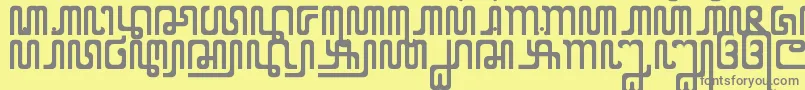 XCodeFromEast-Schriftart – Graue Schriften auf gelbem Hintergrund