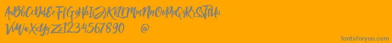 Rofitaste-Schriftart – Graue Schriften auf orangefarbenem Hintergrund