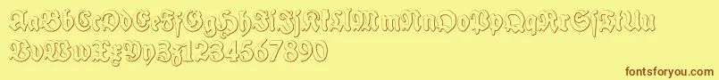 フォントSchneidlerHalbFetteBeveledFree – 茶色の文字が黄色の背景にあります。