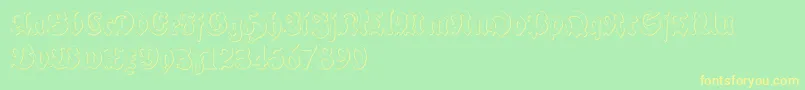 フォントSchneidlerHalbFetteBeveledFree – 黄色の文字が緑の背景にあります