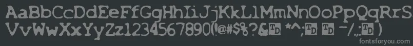 X-fontti – harmaat kirjasimet mustalla taustalla