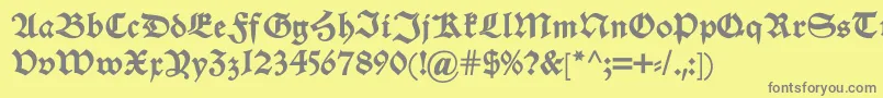 フォントAlteschwabacherdemi – 黄色の背景に灰色の文字