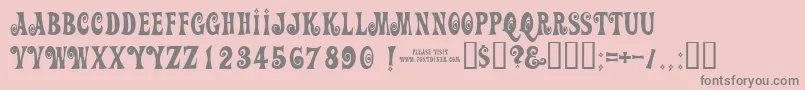 フォントActionIsJl – ピンクの背景に灰色の文字