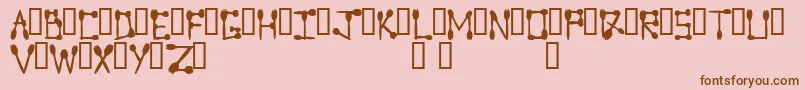 Sporktype Font – Brown Fonts on Pink Background