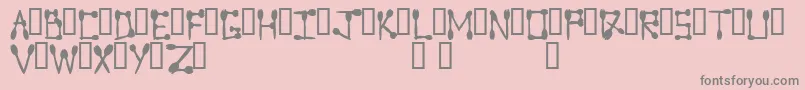 フォントSporktype – ピンクの背景に灰色の文字