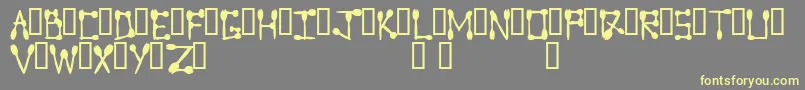 Sporktype Font – Yellow Fonts on Gray Background