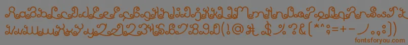 フォントEtherealSkyBold – 茶色の文字が灰色の背景にあります。