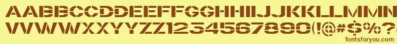 Подробнее о шрифте TrafaretKit Шрифт TrafaretKit – коричневые шрифты на жёлтом фоне