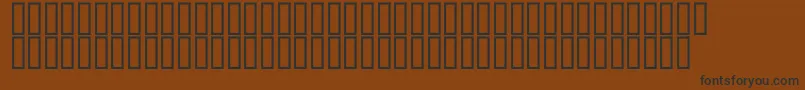 Czcionka McsClockHigh – czarne czcionki na brązowym tle