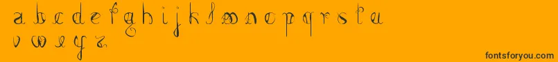 FemmeFatal-Schriftart – Schwarze Schriften auf orangefarbenem Hintergrund