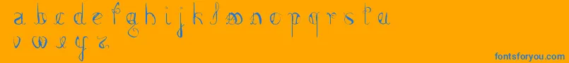 FemmeFatal Font – Blue Fonts on Orange Background