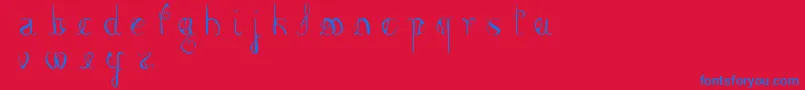 FemmeFatal Font – Blue Fonts on Red Background