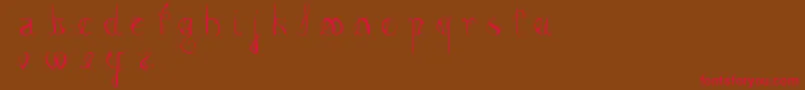 FemmeFatal Font – Red Fonts on Brown Background