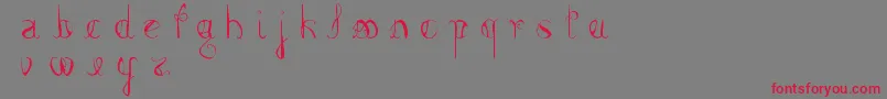 FemmeFatal-Schriftart – Rote Schriften auf grauem Hintergrund