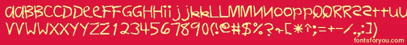 Fonte FirstgradedisplaycapssskRegular – fontes amarelas em um fundo vermelho