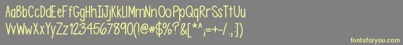 Asdfghjkl Font – Yellow Fonts on Gray Background