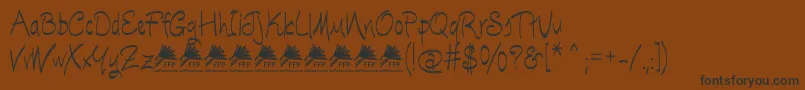 EscobetaOneFfp Font – Black Fonts on Brown Background