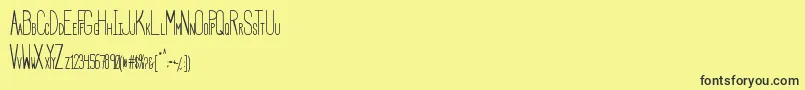 HbmSerenityBook-fontti – mustat fontit keltaisella taustalla
