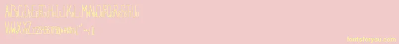 フォントHbmSerenityBook – 黄色のフォント、ピンクの背景