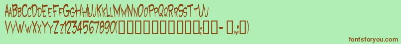 GrooteskBold-Schriftart – Braune Schriften auf grünem Hintergrund