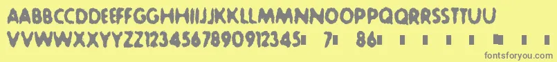 SludgeBucket-Schriftart – Graue Schriften auf gelbem Hintergrund