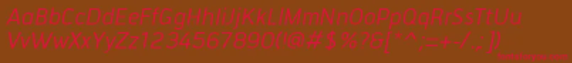フォントTiranaItalic – 赤い文字が茶色の背景にあります。