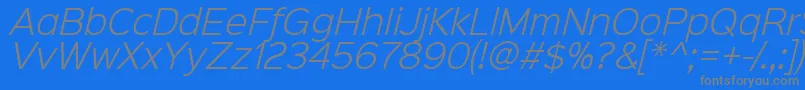 Sinkinsans300lightitalic-Schriftart – Graue Schriften auf blauem Hintergrund