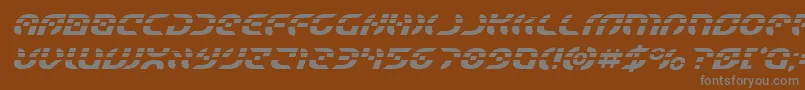 フォントStarfighterlaserital – 茶色の背景に灰色の文字