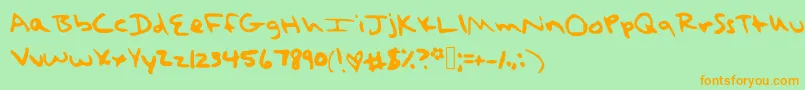 フォントTaylorSwiftHandwritingFont – オレンジの文字が緑の背景にあります。