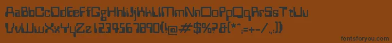 フォントWestm – 黒い文字が茶色の背景にあります