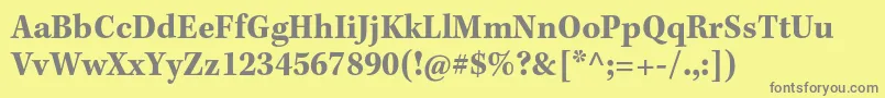 KeplerstdBoldscncapt-Schriftart – Graue Schriften auf gelbem Hintergrund