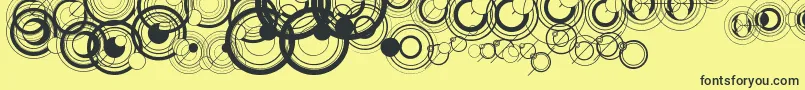 Fonte WsSimpleGallifreyan – fontes pretas em um fundo amarelo