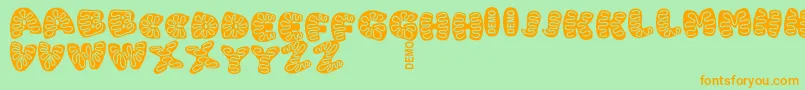 IcingCookiesDemo Font – Orange Fonts on Green Background