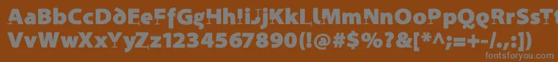 ProthesisBlack-Schriftart – Graue Schriften auf braunem Hintergrund