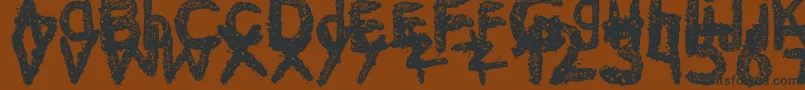 Подробнее о шрифте Ke$Hanimal2 Шрифт Ke$Hanimal2 – чёрные шрифты на коричневом фоне