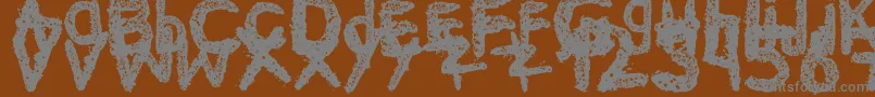 Ke$Hanimal2 Font – Gray Fonts on Brown Background