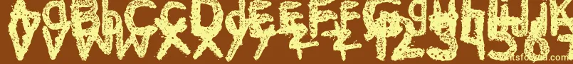 フォントKe$Hanimal2 – 黄色のフォント、茶色の背景