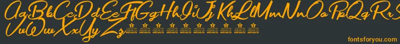 MovieMakersPersonalUse Font – Orange Fonts on Black Background