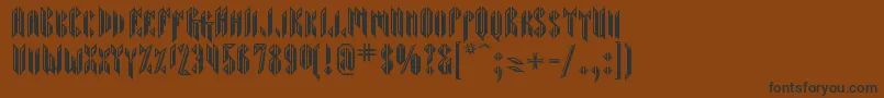 フォントSarcophagus – 黒い文字が茶色の背景にあります