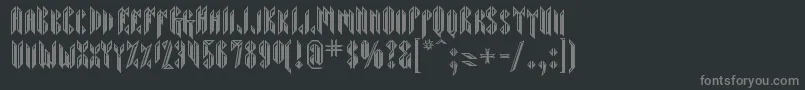 Sarcophagus-fontti – harmaat kirjasimet mustalla taustalla