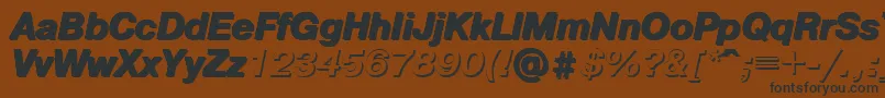 フォントPgsi – 黒い文字が茶色の背景にあります