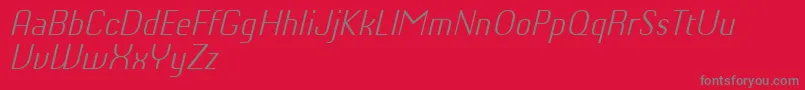 ChiqReducedLightitalic-Schriftart – Graue Schriften auf rotem Hintergrund
