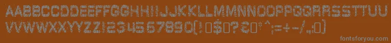 GlazkrakRegular Font – Gray Fonts on Brown Background