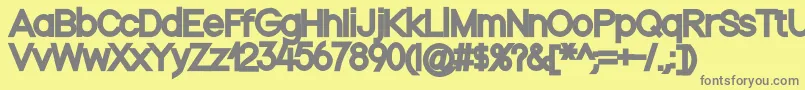 フォントNordicablack – 黄色の背景に灰色の文字